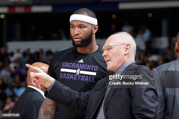 Head coach George Karl of the Sacramento Kings coaches DeMarcus Cousins against the Atlanta Hawks on March 16, 2015 at Sleep Train Arena in...