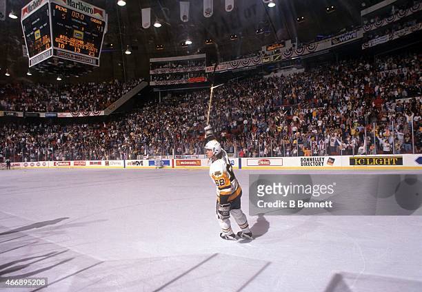 Jaromir Jagr of the Pittsburgh Penguins salutes the fans after Game 1 of the 1992 Stanley Cup Finals against the Chicago Blackhawks on May 26, 1992...