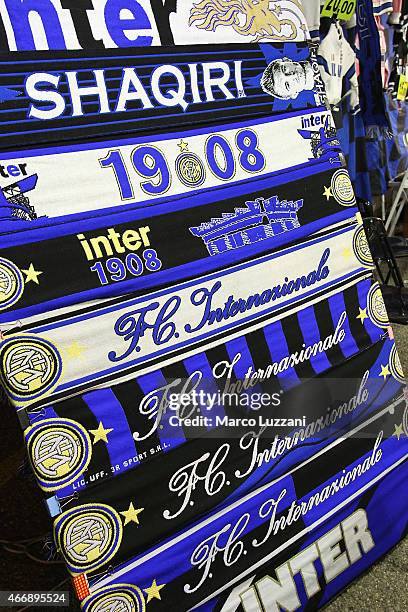 Internazionale Milano scarves are displayed for sale at a stall outside the stadium before the UEFA Europa League Round of 16 match between FC...