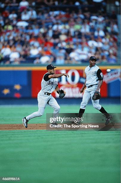 Tony Womack of the Arizona Diamond Backs fields against the Atlanta Braves at Turner Field in Atlanta, Georiga on August 10, 2001.