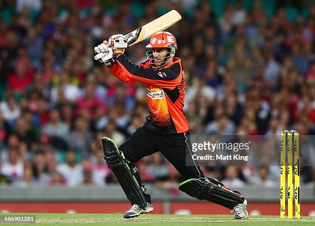 Simon Katich of the Scorchers drives during the Big Bash League semi final match between the Sydney Sixers and the Perth Scorchers at Sydney Cricket...