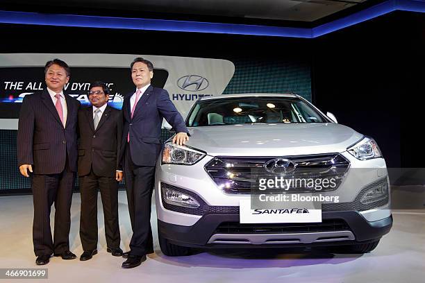 Bo Shin Seo, managing director and chief executive officer of Hyundai Motor India Ltd., right to left, Rakesh Srivastava, senior vice president of...