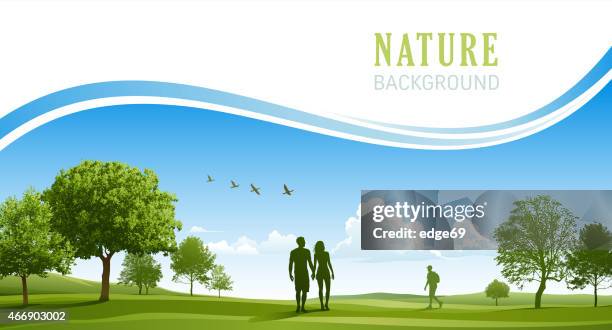 happy young couple walking in the spring park - blue cloud sky stock illustrations