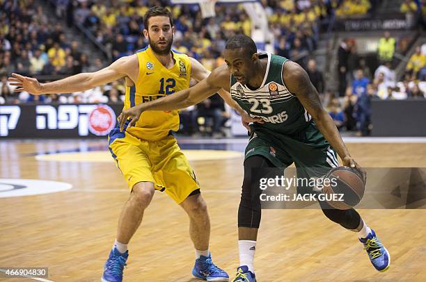 Lithuanian Zalgiris Kaunas's US forward James Anderson vies for the ball against Israel Maccabi Electra Tel Aviv's Israeli guard Yogev Ohayon during...