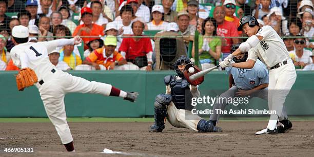 Pitcher Yuki Saito of Waseda Jitsugyo High School throws the last pitch to strike out pitcher Masahiro Tanaka of Komadai Tomakomai High School to win...