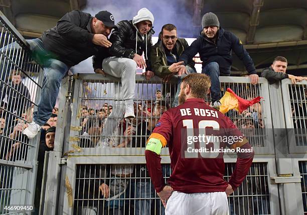 Roma player Daniel De Rossi speaks with fans after the game the UEFA Europa League Round of 16 match between AS Roma and ACF Fiorentina at Olimpico...