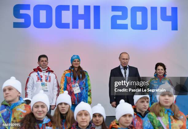 Russian Federation Chef de Mission Alexander Kravtsov, Olympic Village Mayor Elena Isinbaeva and Russian President Vladimir Putin visit the Coastal...