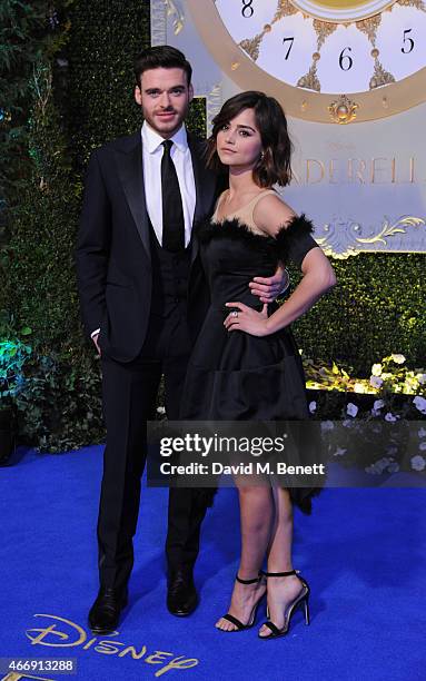 Richard Madden and Jenna Coleman attend the UK Premiere of "Cinderella" at Odeon Leicester Square on March 19, 2015 in London, England.