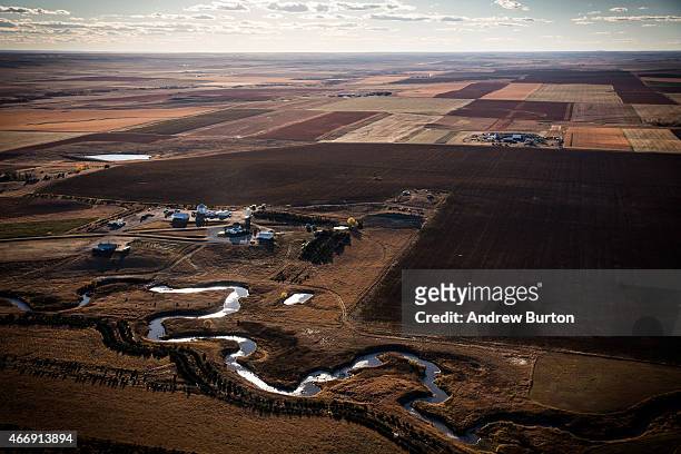 Creek weaves through the rolling hills of South Dakota near the land where the proposed Keystone XL pipeline would pass on October 13, 2014 south of...