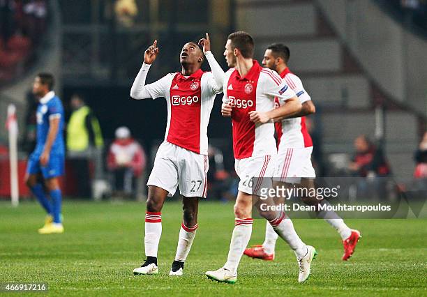 Riechedly Bazoer of Ajax celebrates after scoring a goal to level the scores at 1-1 on aggregate during the UEFA Europa League Round of 16, second...