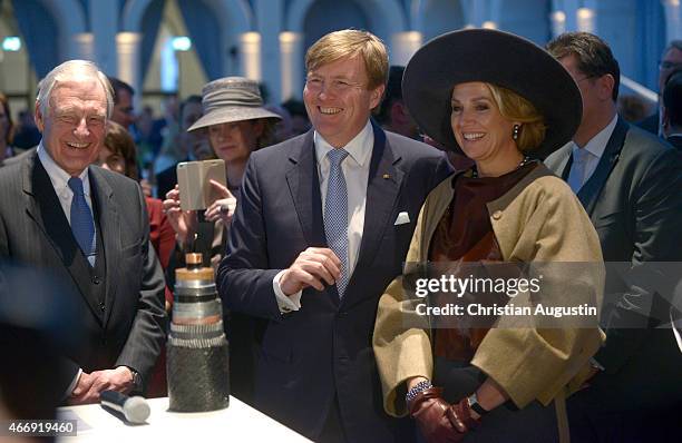 Dr.Karl Joachim Dreyer, Queen Maxima and King Willem-Alexander of The Netherlands attend a renewable energy exhibition at chamber of commerce on...