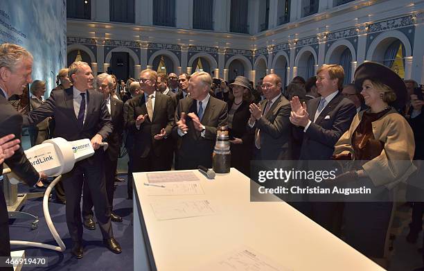 Queen Maxima and King Willem-Alexander of The Netherlands attend a renewable energy exhibition at chamber of commerce on March 19, 2015 in Hamburg,...