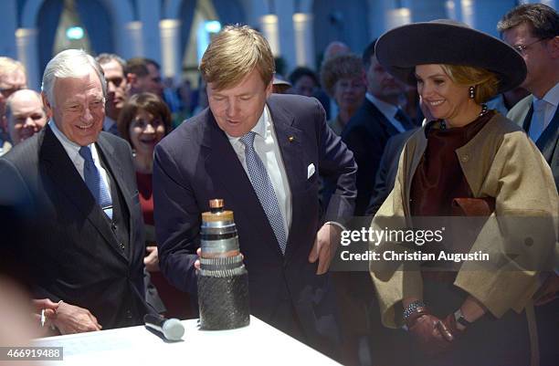 Dr.Karl Joachim Dreyer, Queen Maxima and King Willem-Alexander of The Netherlands attend a renewable energy exhibition at chamber of commerce on...