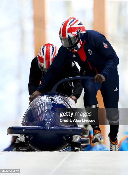 Lamin Deen and Craig Pickering of Great Britain practise a bobsleigh run ahead of the Sochi 2014 Winter Olympics at the Sanki Sliding Center on...