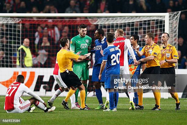 Scuffle breaks out between goalkeeper Denys Boyko of Dnipro and Mike van der Hoorn of Ajax following the finalk whistle during the UEFA Europa League...