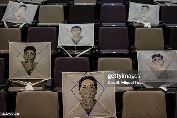 Kites with pictures of the missing students of Ayotzinapa Teacher Training College created by the Mexican artist Francisco Toledo displayed at Memory...