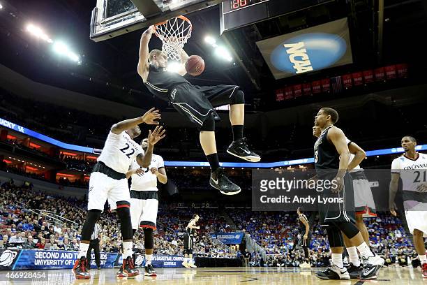 Isaac Haas of the Purdue Boilermakers dunks against the Cincinnati Bearcats during the second round of the 2015 NCAA Men's Basketball Tournament at...