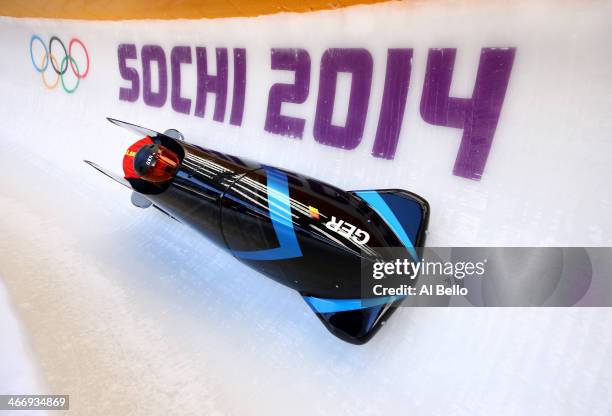 Sandra Kiriasis and Franziska Fritz of Germany practise a bobsleigh run ahead of the Sochi 2014 Winter Olympics at the Sanki Sliding Center on...