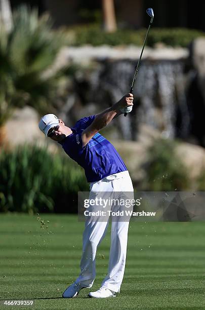 Zach Johnson plays the fifteenth hole at La Quinta Country Club Course during the first round of the Humana Challenge in partnership with the Clinton...