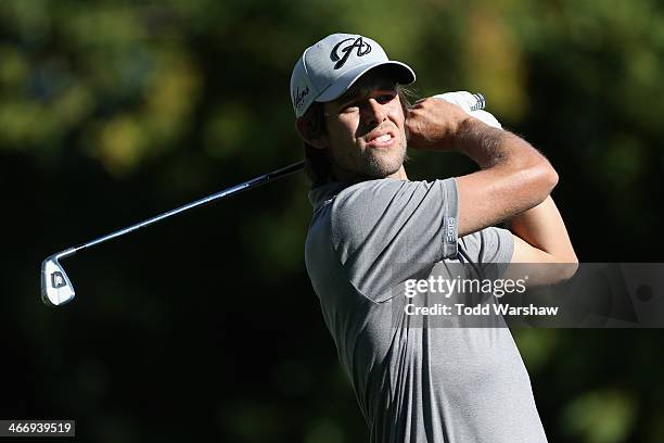 Aaron Baddeley of Australia plays a shot on the 7th hole at La Quinta Country Club Course during the first round of the Humana Challenge in...