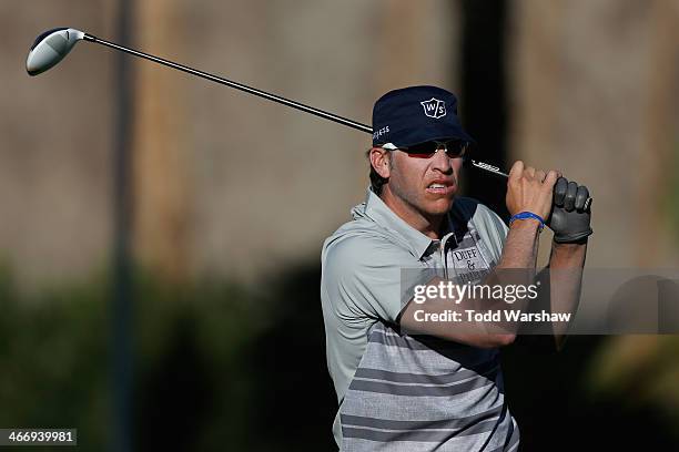 Ricky Barnes hits a tee shot on the 11th hole at La Quinta Country Club Course during the first round of the Humana Challenge in partnership with the...