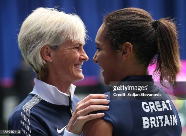 Heather Watson of Great Britain celebrate victory with team captain Judy Murray against Jelena Ostapenko of Latvia during the day one Fed Cup Fed Cup...