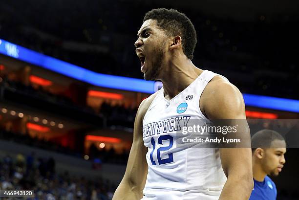 Karl-Anthony Towns of the Kentucky Wildcats reacts against the Hampton Pirates during the second round of the 2015 NCAA Men's Basketball Tournament...