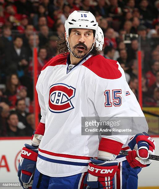 George Parros of the Montreal Canadiens skates against the Ottawa Senators at Canadian Tire Centre on January 16, 2014 in Ottawa, Ontario, Canada.