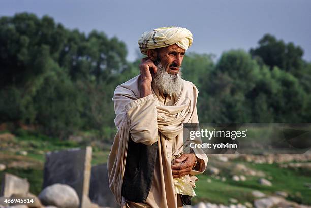 afghan man - senior man grey long hair stock pictures, royalty-free photos & images