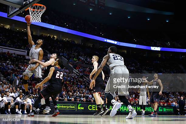 Mikael Hopkins of the Georgetown Hoyas drives to the basket against Felix Von Hofe of the Eastern Washington Eagles in the second half during the...