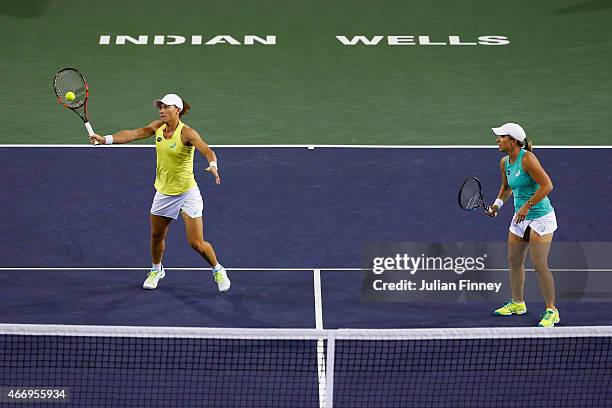 Lisa Raymond of USA and Sam Stosur of Australia in action against Martina Hingis of Switzerland and Sania Mirza of India in the doubles during day...