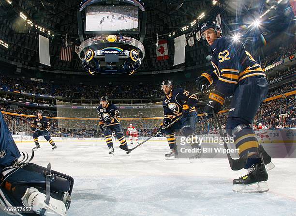 Matt Moulson, Tyler Ennis, Drew Stafford and Alexander Sulzer of the Buffalo Sabres defend against the Carolina Hurricanes on January 23, 2014 at the...