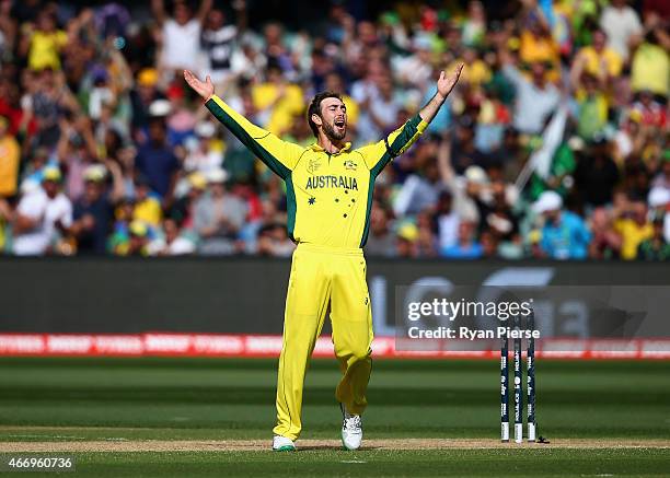 Glenn Maxwell of Australia celebrates after taking the wicket of Umar Akmal of Pakistan during the 2015 ICC Cricket World Cup match between...