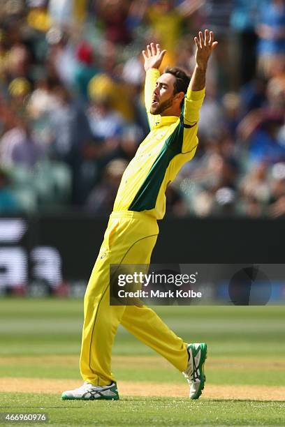 Glenn Maxwell of Australia celebrates after taking the wicket of Umar Akmal of Pakistan during the 2015 ICC Cricket World Cup match between...