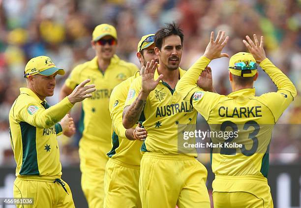 Mitchell Johnson of Australia celebrates after taking the wicket of Haris Sohail of Pakistan during the 2015 ICC Cricket World Cup match between...