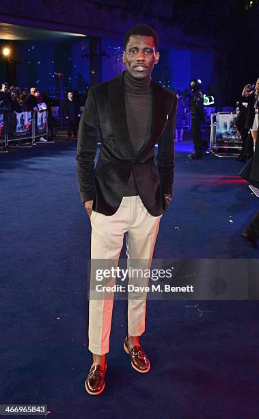 Wretch 32 attends the World Premiere of "RoboCop" at the BFI IMAX on February 5, 2014 in London, England.