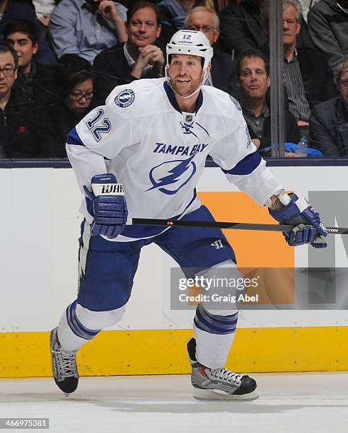 Ryan Malone of the Tampa Bay Lightning skates during NHL game action against the Toronto Maple Leafs January 28, 2014 at the Air Canada Centre in...