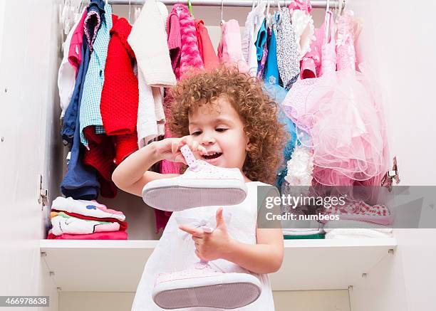 little girl in her room - childrens closet stock pictures, royalty-free photos & images