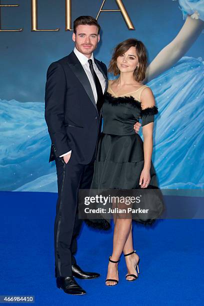 Richard Madden and Jenna-Louise Coleman attends the UK Premiere of "Cinderella" at Odeon Leicester Square on March 19, 2015 in London, England.