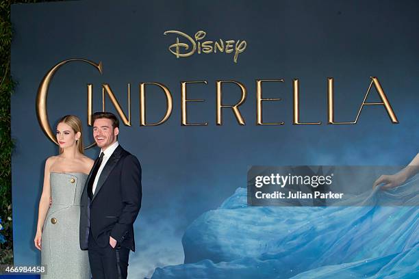 Lily James and Richard Madden attends the UK Premiere of "Cinderella" at Odeon Leicester Square on March 19, 2015 in London, England.