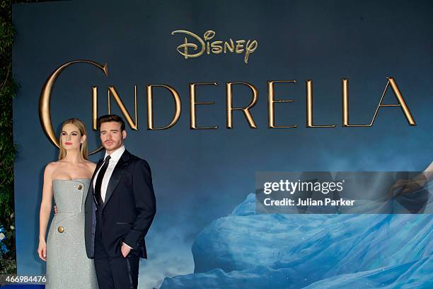 Lily James and Richard Madden attends the UK Premiere of "Cinderella" at Odeon Leicester Square on March 19, 2015 in London, England.