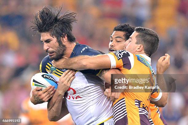 James Tamou of the Cowboys attempts to break away from the defence during the round three NRL match between the Brisbane Broncos and the North...