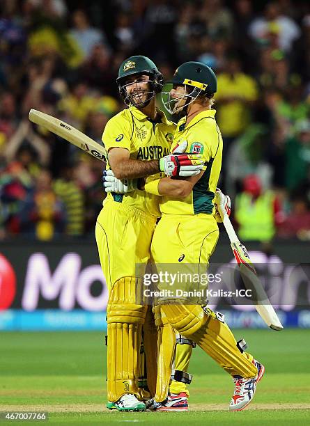 Glenn Maxwell of Australia celebrates with Shane Watson of Australia after Australia takes victory during the 2015 ICC Cricket World Cup match...