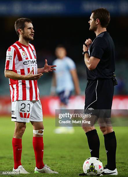 Mate Dugandzic of Melbourne City speaks with referee Chris Beath during the round 22 A-League match between Sydney FC and Melbourne City FC at...