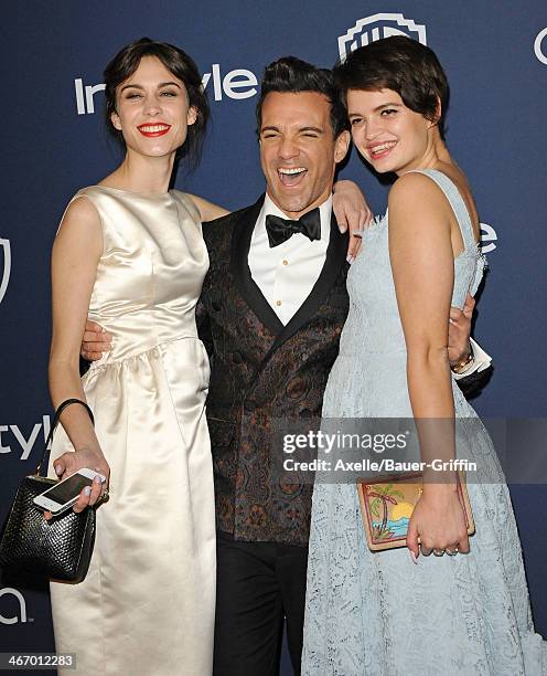 Alexa Chung, George Kotsiopoulos and Pixie Geldof arrive at the 2014 InStyle And Warner Bros. 71st Annual Golden Globe Awards Post-Party at The...