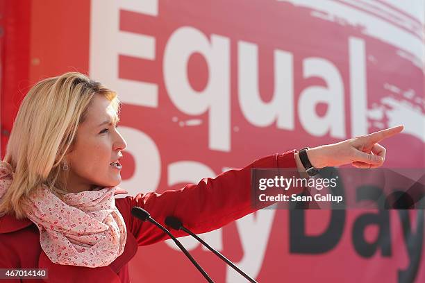 German Family Minister Manuela Schwesig speaks to men and women rallying for equal pay for women compared to men on Equal Pay Day on March 20, 2015...