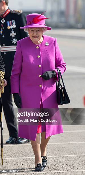 Queen Elizabeth II visits HMS Ocean on March 20, 2015 in Plymouth, England.