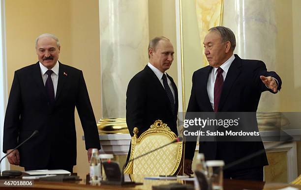 Belarussian President Alexander Lukashenko, Russian President Vladimir Putin and Kazakh President Nursultan Nazarbayev attend the congress of Russian...