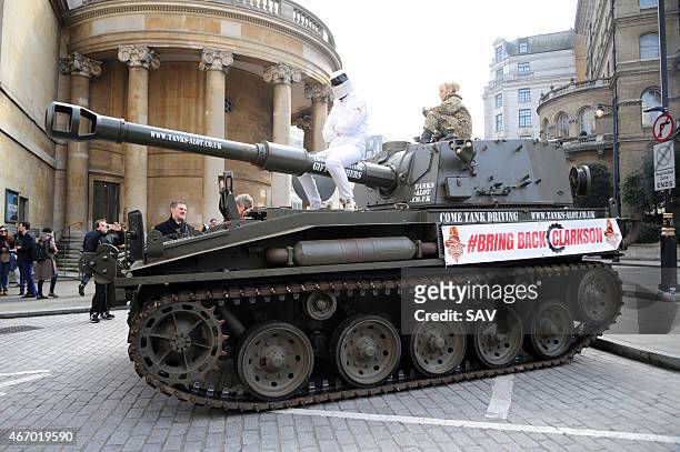 The Stig sighting at The BBC on March 20, 2015 in London, England. The Stig arrived in a tank to deliver a petition, Change.orgs fastest ever growing...