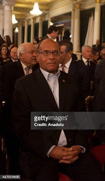 Former Tunisian president Moncef Marzouki is seen at the Carthage Palace during the Independence Day celebrations marking the 58th anniversary of the...